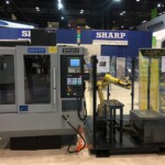 Sharp Industries SV-2414SX vertical mill with robot loader / unloader